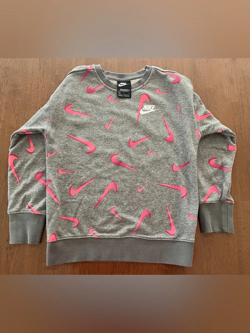 Nike Kids M Gray Crewneck Sweatshirt with Pink Swoosh Pattern